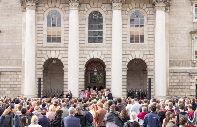 Wide shot of front square with lots of people