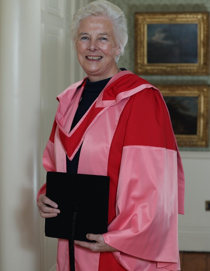 Woman in pink robes