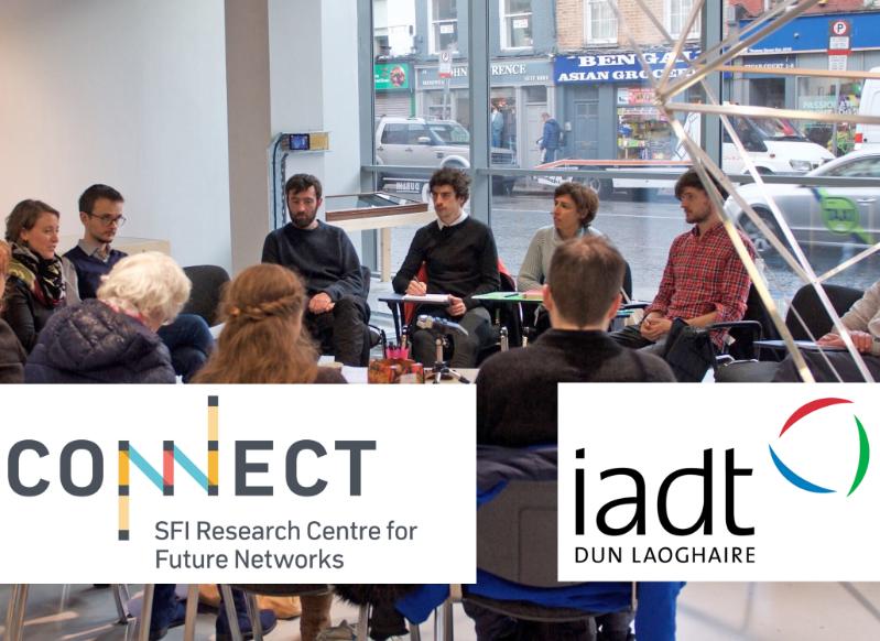 Stakeholders from the CONNECT centre and IADT sit in a circle in discussion.