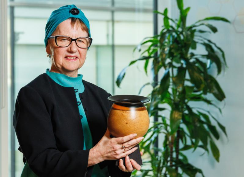 Christine Casey with her Researcher of the Year Award