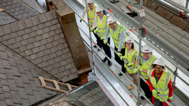 People in protective clothing on a construction site
