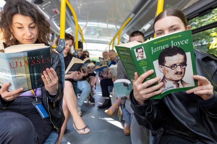 People reading books on the bus