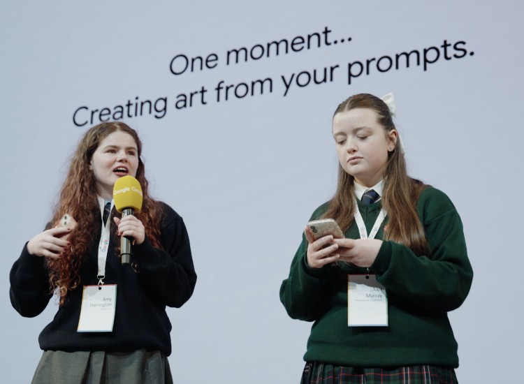 Two female students present