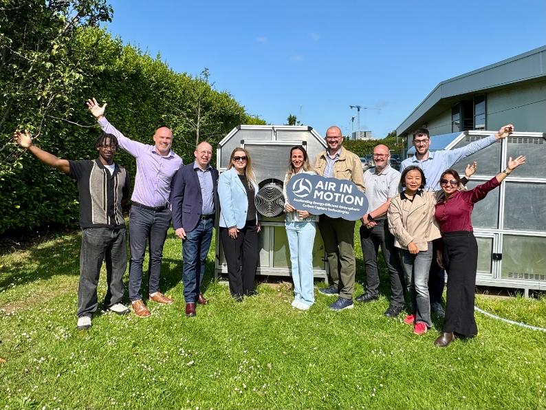 The AirinMotion and daa teams with the prototype at Dublin Airport.