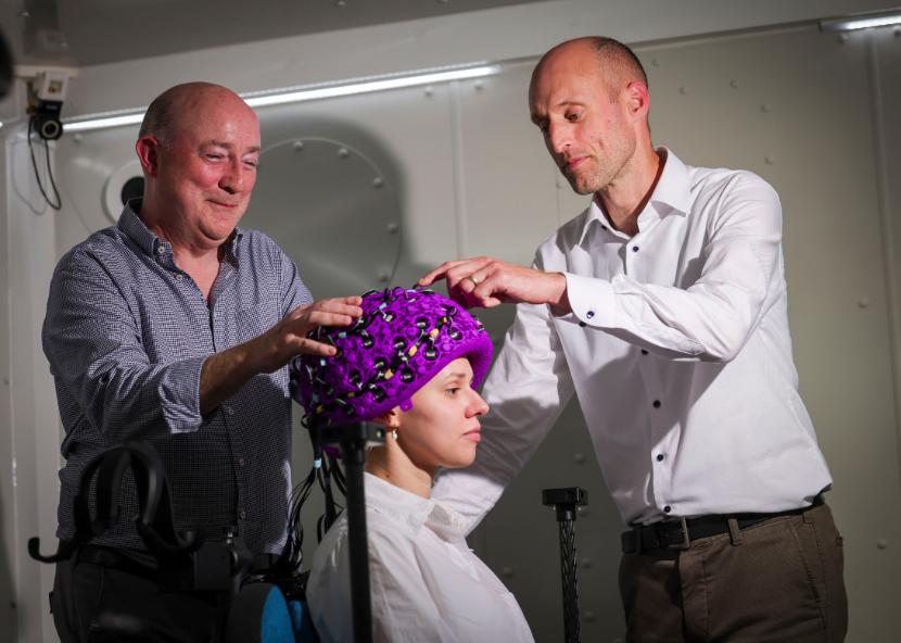 Picture Pictured in Ireland’s first OPM-MEG system in Trinity College Institute of Neuroscience are:  Professor Redmond O’Connell, School of Psychology and Trinity College Institute of Neuroscience  PhD candidate Daria Monakhovych, School of Psychology and Trinity College Institute of Neuroscience  Ciaran Conneely, Operations Manager of Trinity College Institute of Neuroscience