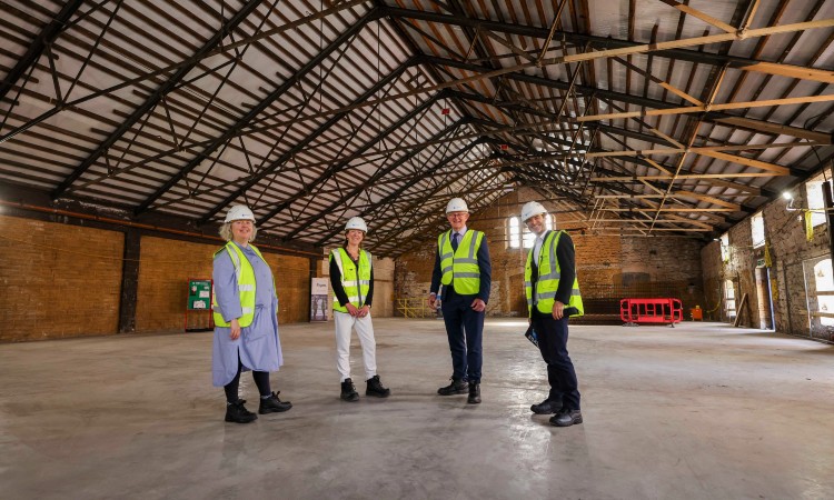 Provost Linda Doyle, Bursar Eleanor Denny, EI's Tom Kelly and Mark Bennett