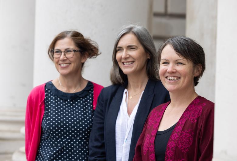 Professors Jane Stout, Anna Davies and Clare Kelly stand on the Chapel steps in Front Square.