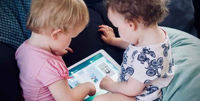 babies playing with ipad